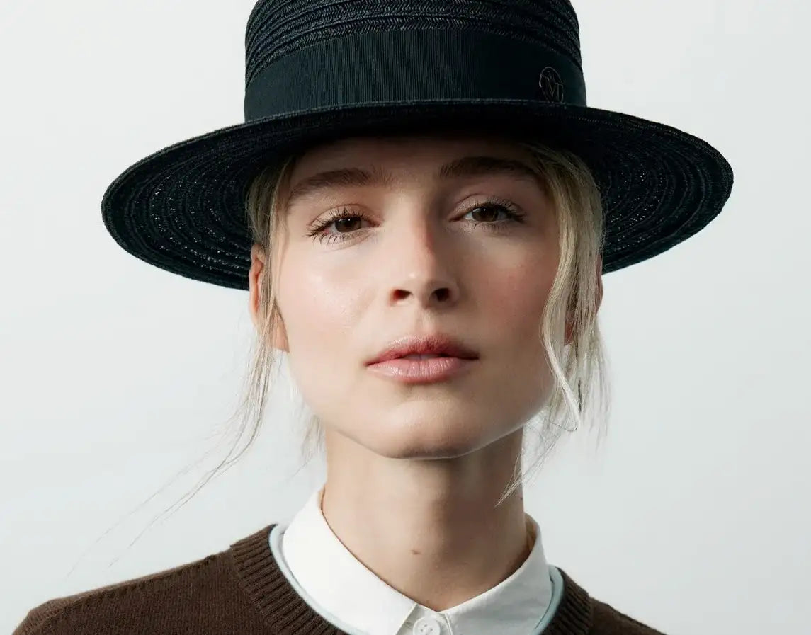 Chapeau Maison Michel en paille noire porté, au Shop 17 à Cannes