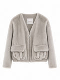 Veste courte en fausse fourrure zippée