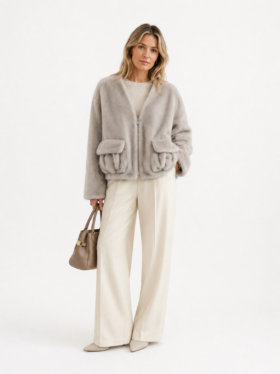 Veste courte en fausse fourrure zippée