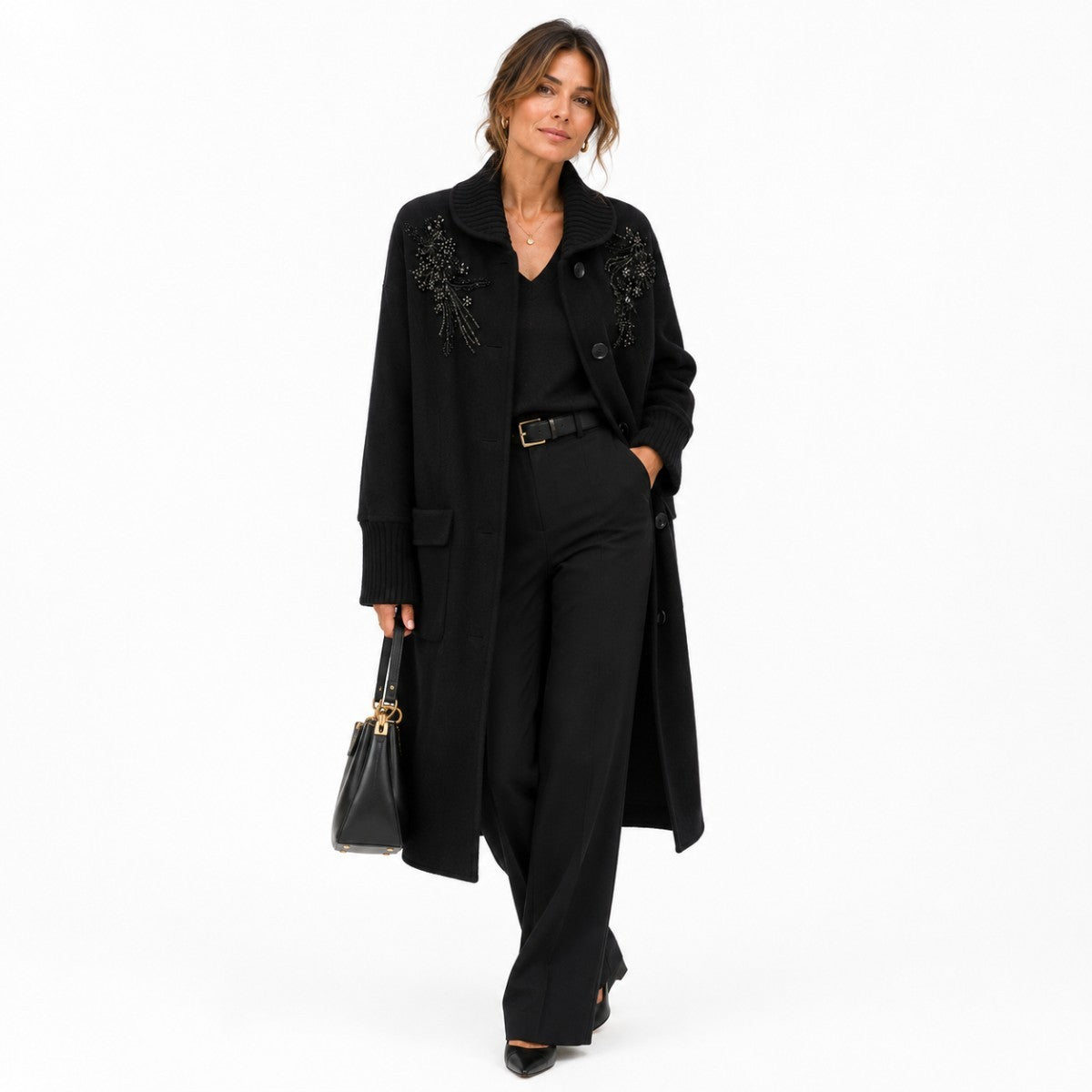Manteau noir à broderies perlées et col côtelé