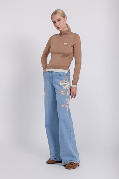 FLARE JEANS WITH FLORAL EMBROIDERY