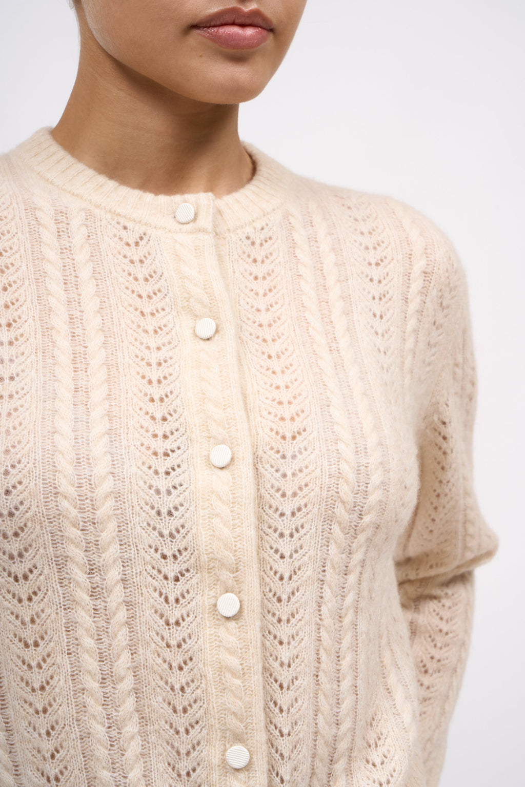 Cardigan Novelo  ajouré en cachemire mélangé couleur écru