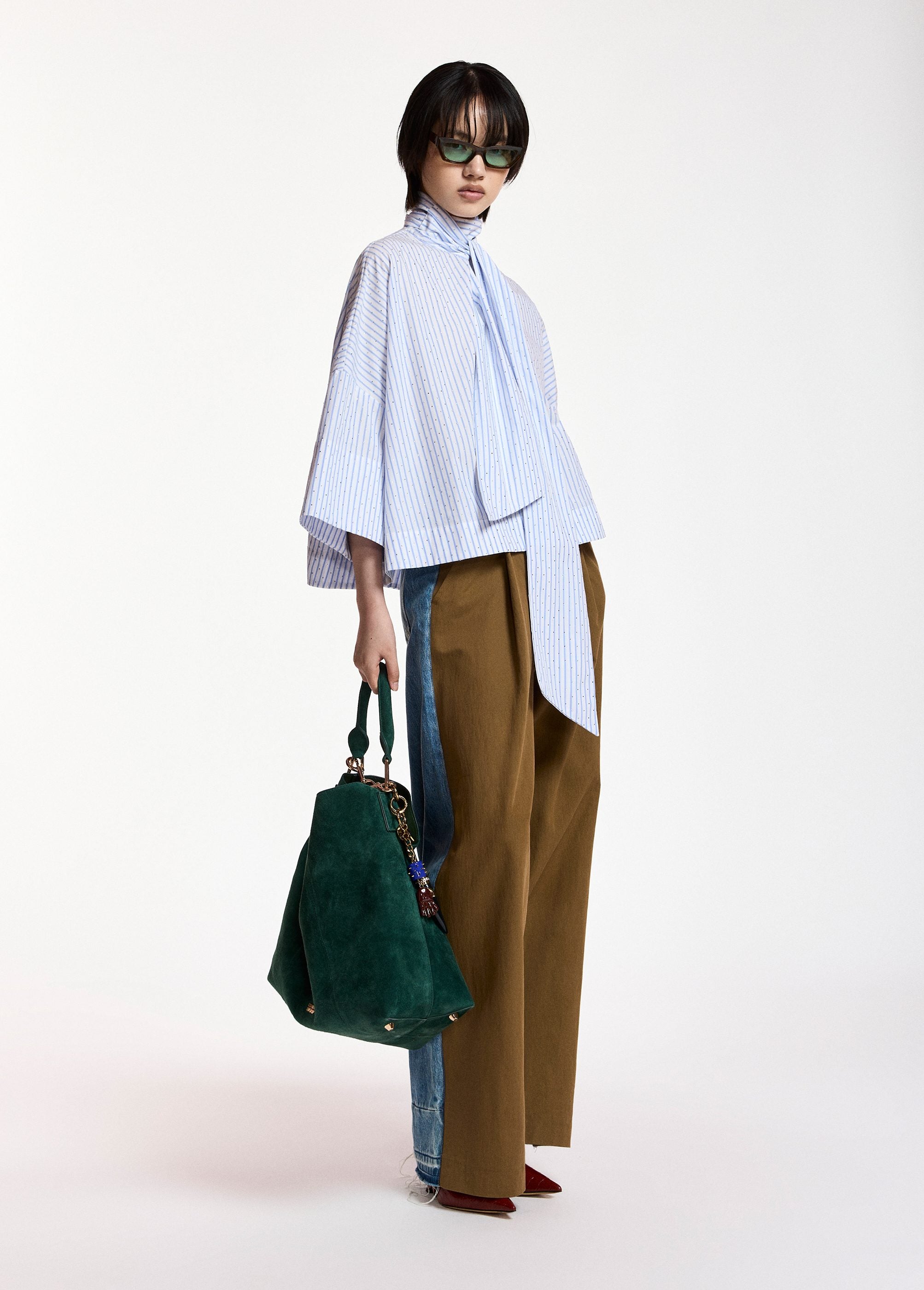 Pussy-bow top with trumpet sleeves and light blue and white stripes