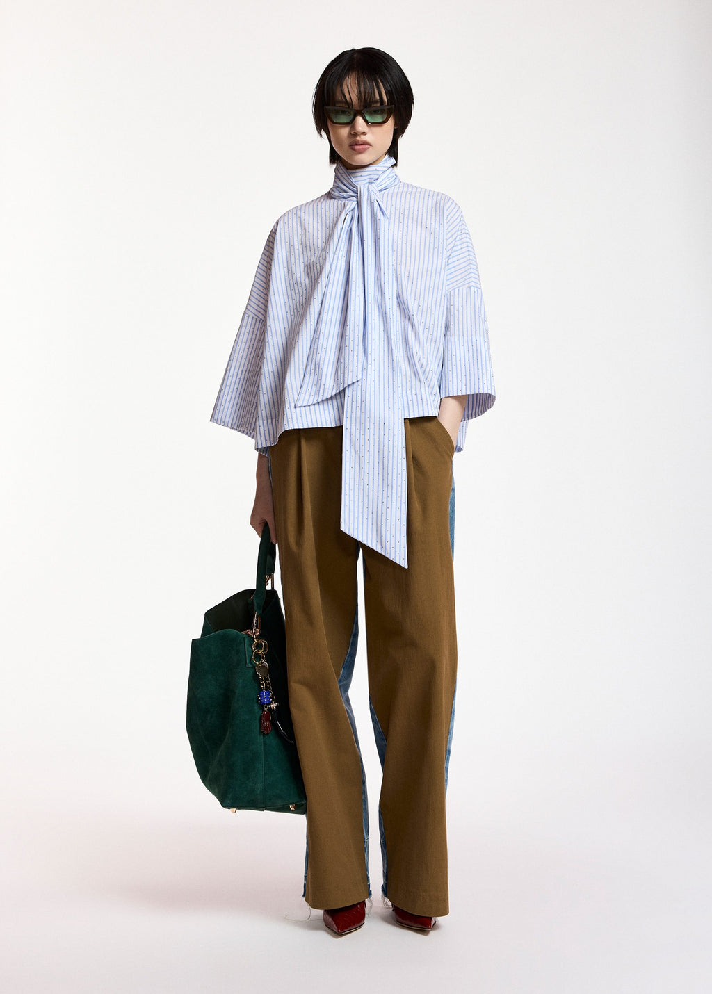 Pussy-bow top with trumpet sleeves and light blue and white stripes